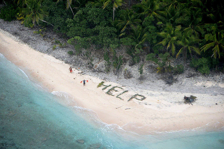 3 rescued island castaways spelled ‘help’ with palm fronds